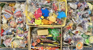 LARGE QUANTITY OF MCDONALDS HAPPY MEAL TOYS and associated items, mostly packaged, contained in 4