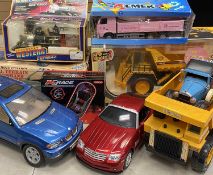 COLLECTION OF LARGE SCALE MODEL CONSTRUCTION VEHICLES AND A BATTERY-OPERATED WESTERN TRAIN, 9