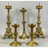 PAIR OF VICTORIAN CAST BRASS PRICKET CANDLE HOLDERS, the trefoil form bases cast with mask heads and