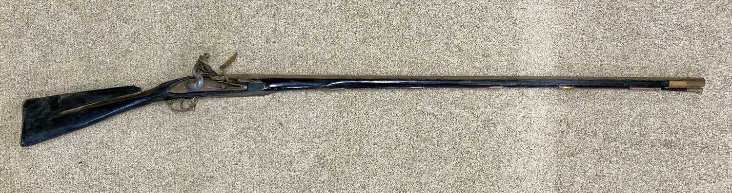 REPLICA FLINTLOCK RIFLE, 115cms cylindrical barrel, with ramrod and sling swivels Provenance: