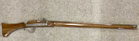 REPLICA MATCHLOCK RIFLE, 108cms cylindrical barrel, with ramrod Provenance: deceased estate Ynys