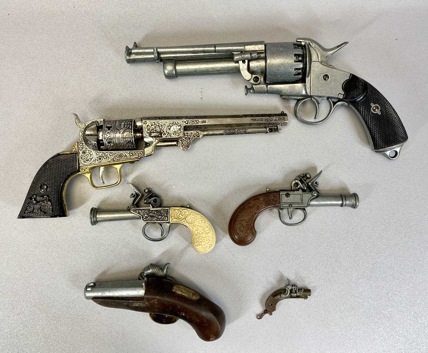 FIVE REPLICA PISTOLS, Spanish 9-shot revolver, 37cms L, Deringer, 17cms L, Spanish Griffin pocket - Image 2 of 6