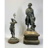 SPELTER FIGURES comprising Napoleon against pillar on associated rustic wooden base, 58cms H, and