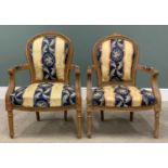 A PAIR OF FRENCH STYLE ELBOW CHAIRS neatly upholstered in blue and gold, 92 (h) x 54 (w) x 45cms (d)