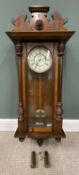 LATE VICTORIAN VIENNA TYPE WALL CLOCK being walnut encased, lion mask upper roundel, pillar