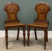PAIR OF VICTORIAN MAHOGANY HALL CHAIRS, shield panel shaped backs, solid seats, turned tapering