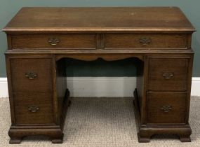 VINTAGE OAK KNEE HOLE DESK, moulded edge top, twin frieze drawers, shaped central apron, twin two