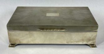 SILVER CIGARETTE BOX, four footed, machined lid, Birmingham, 5 (h) x 16.5 (w) x 9cms (d), 13.9ozt