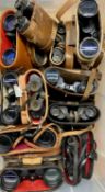 ELEVEN CASED PAIRS BINOCULARS, some vintage, Swift Diensglas etc.  Provenance: private collection