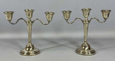 PAIR OF ELIZABETH II SILVER CANDELABRA two branches, three sconces, with removable nozzles, circular