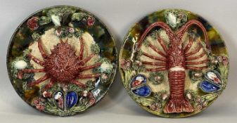 ALVARO JOSE CALDAS DA RAINHA PALISSY WARE DISHES A PAIR, decorated in relief with crab, lobster