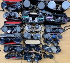 COLLECTION OF OVER TWENTY PAIRS BINOCULARS, some with cases Provenance: private collection Conwy