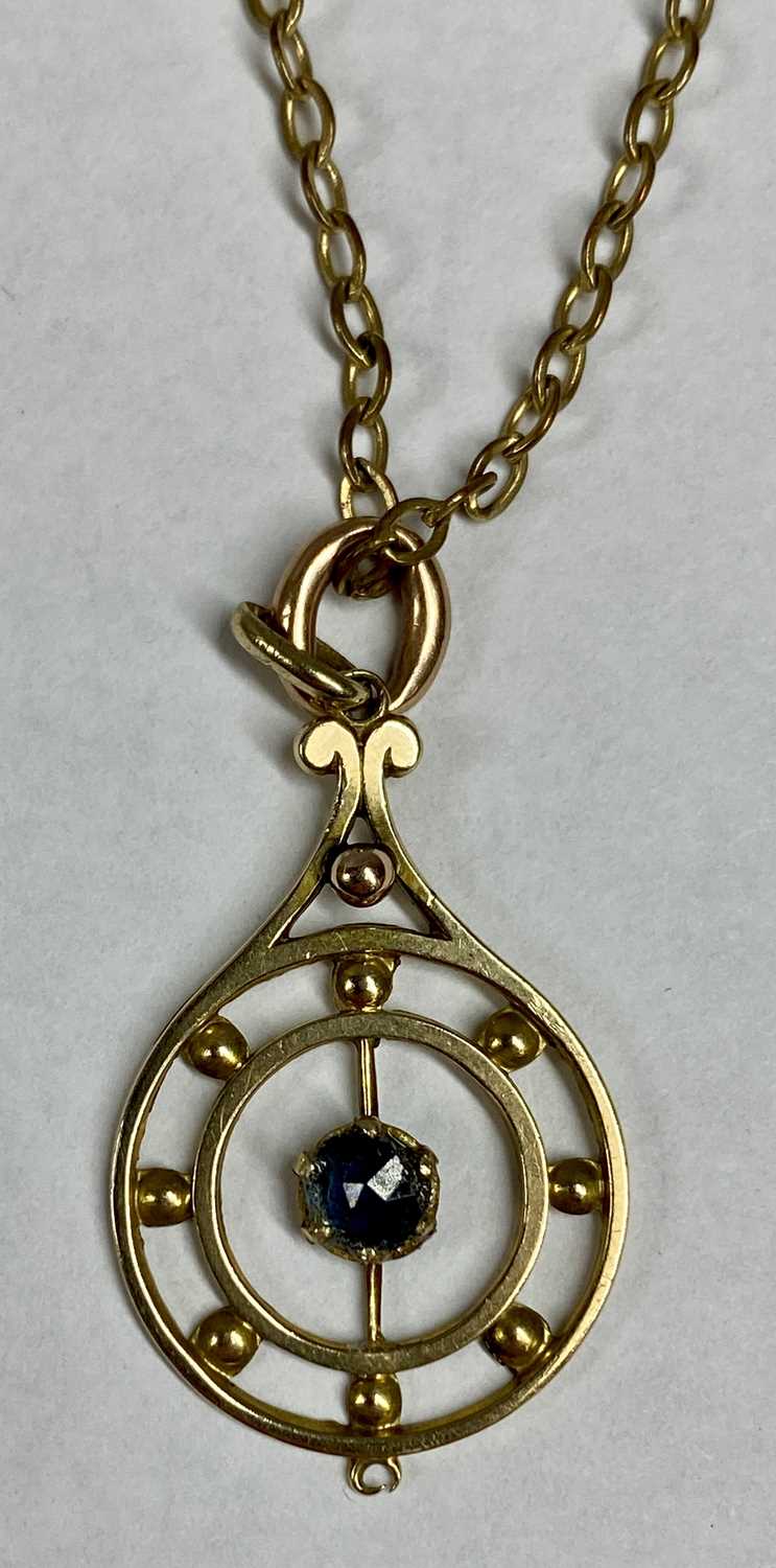 9CT GOLD PENDANT, open work and set with a central sapphire, with 9ct gold fine link necklace, 51cms - Image 2 of 2