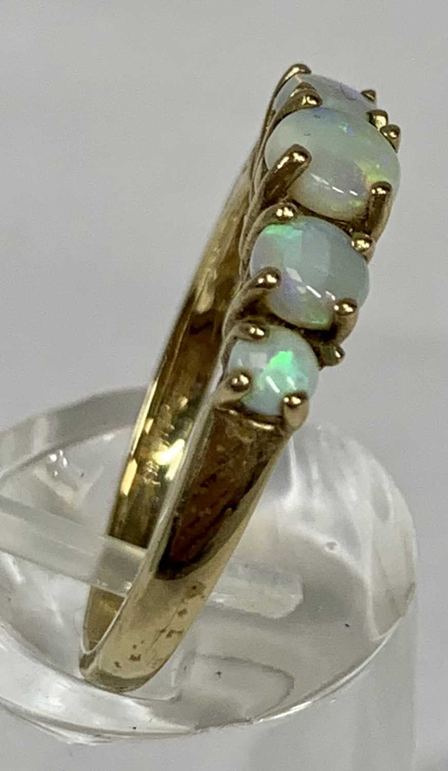 FOUR GOLD/YELLOW METAL RINGS, opal five stone band, size Q, two eternity, size O and K, half - Image 3 of 9