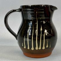 MARGARET LEACH (b. 1918) TAENA COMMUNITY STUDIO TERRACOTTA JUG, Tenmoku glaze with slip