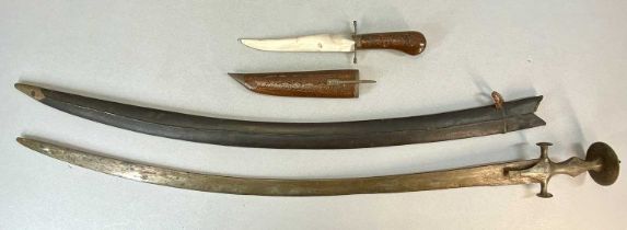 INDIAN TALWAR TYPE SWORD, with 83cms curved blade, with scabbard and an Indian knife with carved