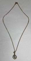 9CT GOLD PENDANT, open work and set with a central sapphire, with 9ct gold fine link necklace, 51cms