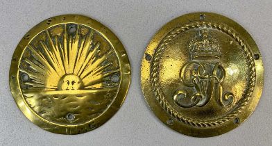 TWO CIRCULAR CAST BRASS WALL PLAQUES, one P&O Shipping line, 15cms (diam.), the other with George IV