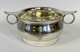 GEORGE V CIRCULAR SILVER QUAICHE, with ring handles, engraved with monogram dated September 5th