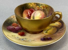 ROYAL WORCESTER MINIATURE CUP & SAUCER, painted with fruit and heavily gilded, signed Ricketts, puce