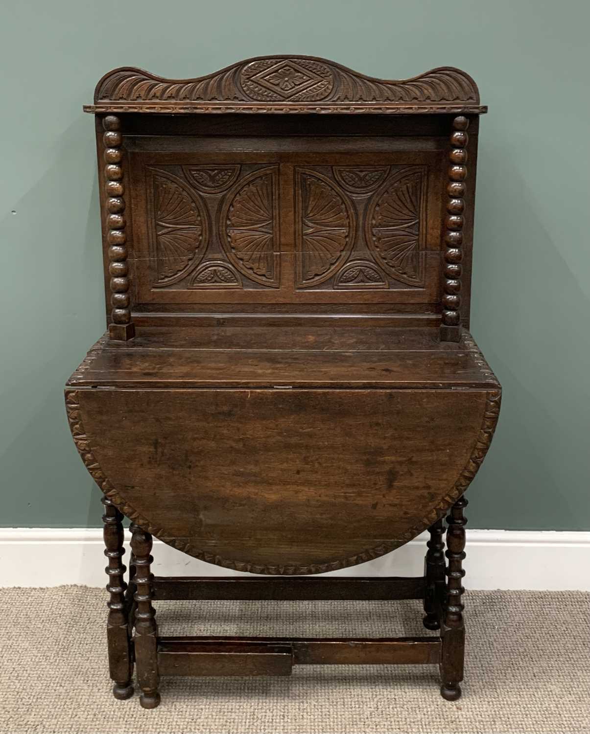 ANTIQUE DROP-LEAF TABLE UNSUALLY MARRIED WITH RAIL-BACK both elements carved, 136 (h) x 85 (w) x