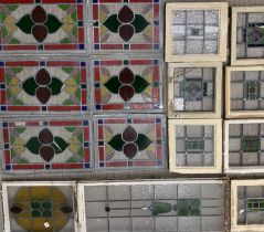 LARGE GROUP OF STAINED & LEADED GLASS PANELS including a metal framed two section door, 181 x 50cms,