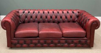 RED LEATHER THREE SEATER CHESTERFIELD SOFA 68 (h) x 208 (w) x 57cms (d) Provenance: private