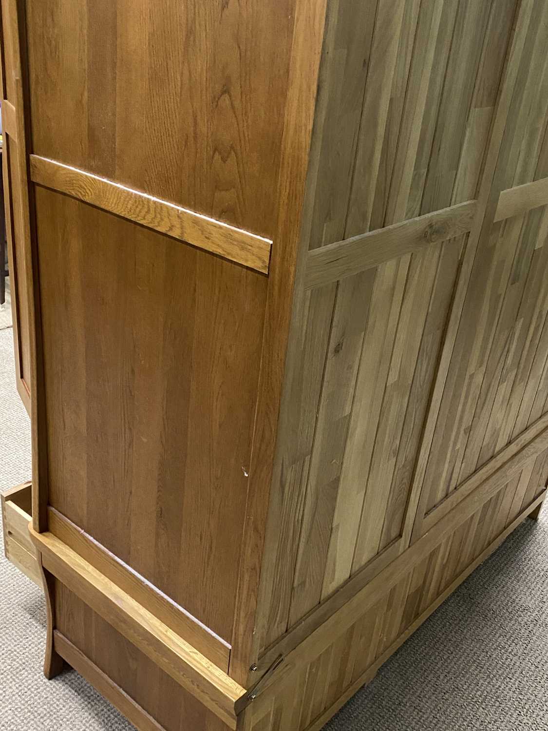 ALMOST NEW OAK TRIPLE WARDROBE having two base drawers, 185 (h) x 144 (w) x 59cms (d) Provenance: - Image 5 of 5