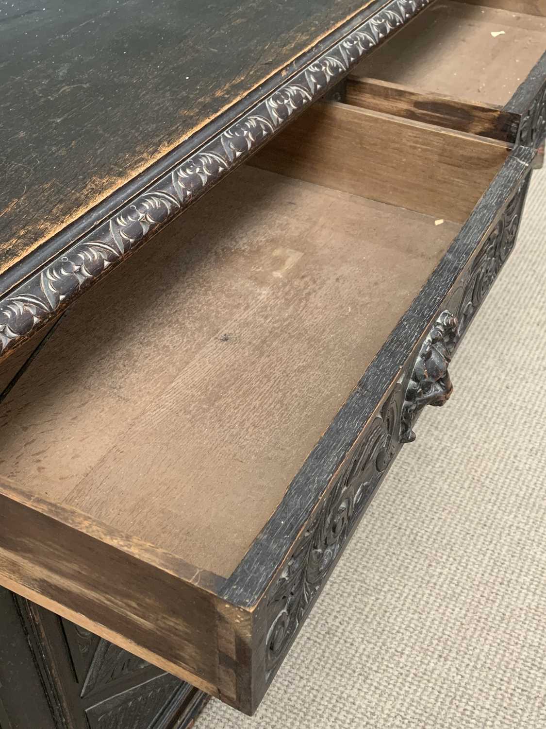 19TH CENTURY SIDEBOARD BASE being ebonised and heavily carved with lion mask detail, two drawers - Image 3 of 6