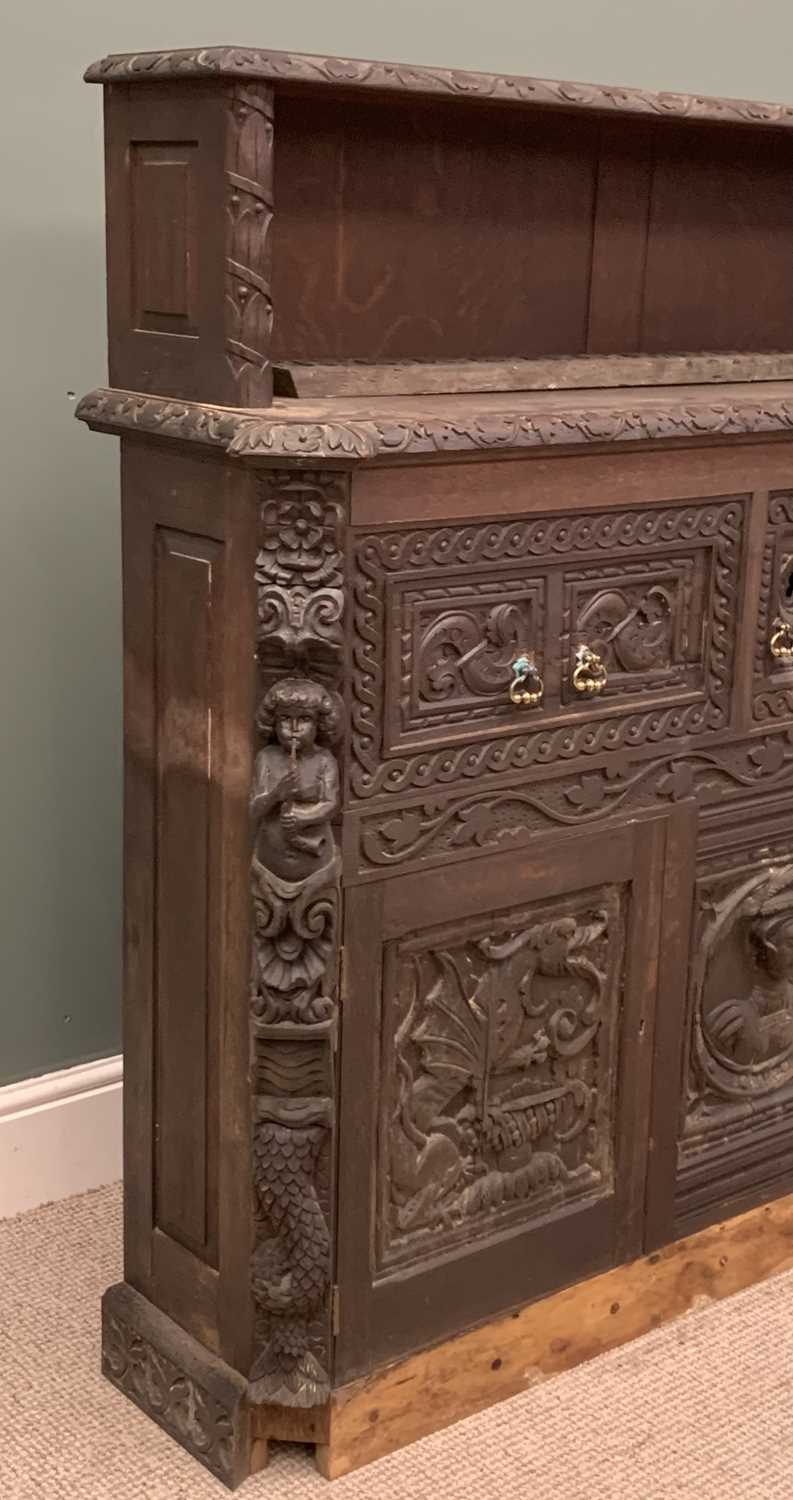 HEAVILY CARVED SIDEBOARD circa 1900, ebonised with heavy carved detail, the base with three deep - Image 7 of 7