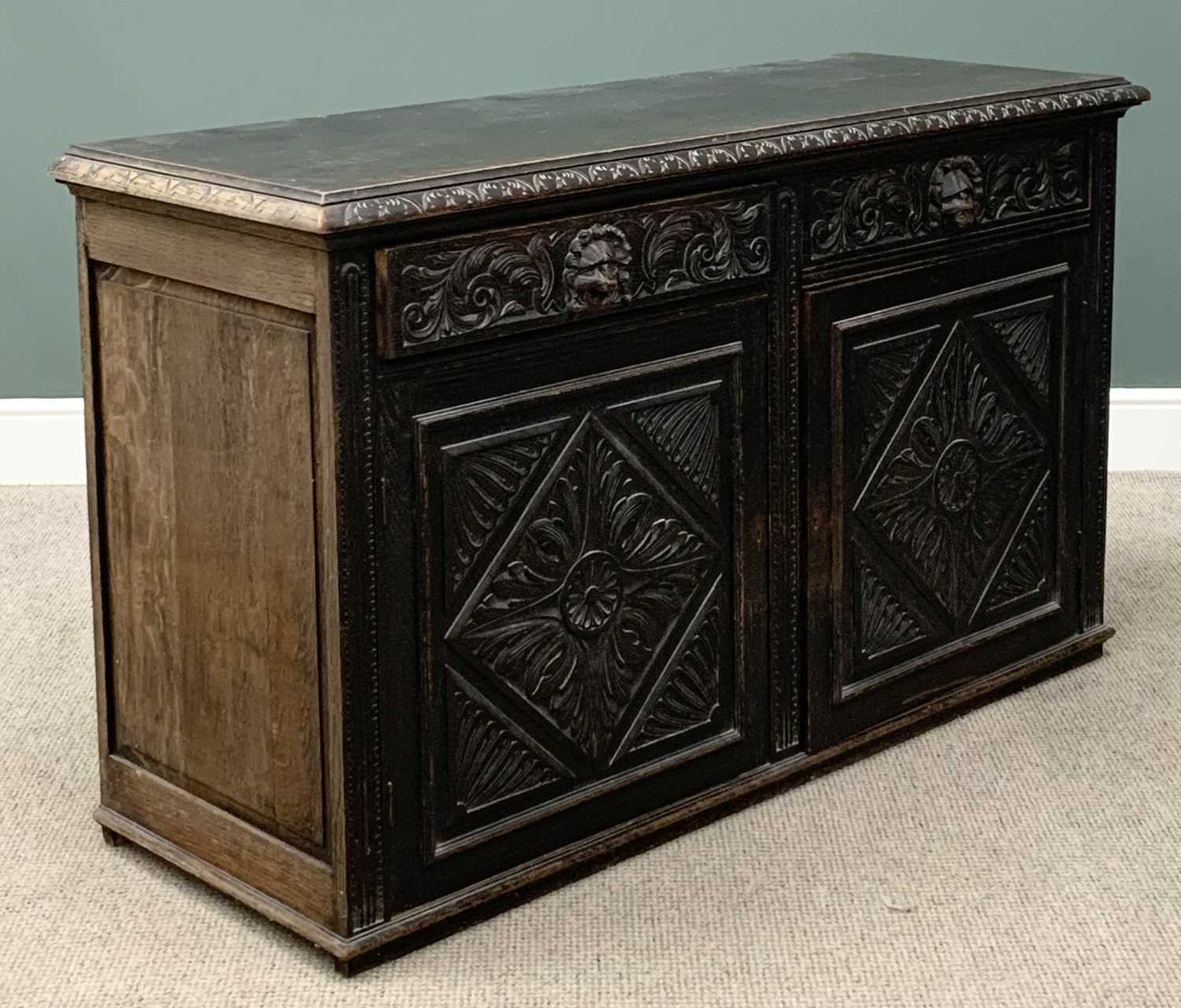 19TH CENTURY SIDEBOARD BASE being ebonised and heavily carved with lion mask detail, two drawers - Image 2 of 6
