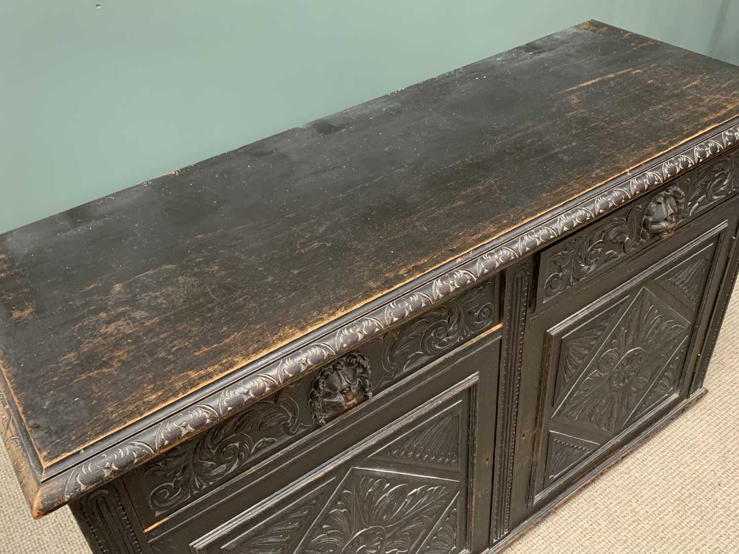 19TH CENTURY SIDEBOARD BASE being ebonised and heavily carved with lion mask detail, two drawers - Image 4 of 6