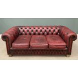 RED LEATHER THREE SEATER CHESTERFIELD TYPE SOFA 68 (h) x 188 (w) x 58cms (d) Provenance: private