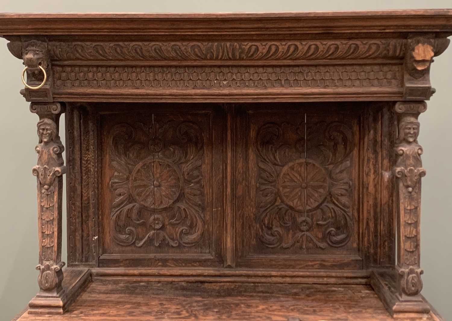 HEAVILY CARVED NARROW COURT CUPBOARD with canopy top and single base cupboard door, lion masks and - Image 7 of 7