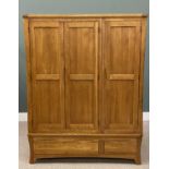 ALMOST NEW OAK TRIPLE WARDROBE having two base drawers, 185 (h) x 144 (w) x 59cms (d) Provenance: