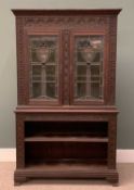 EDWARDIAN CARVED OAK BOOKCASE circa 1900, having an open two shelf base, below elaborately leaded