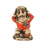 GROGG CARICATURE BY JOHN HUGHES standing on titled base, 'Mauler Morgan', wearing Wales No.2