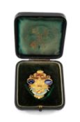 A RARE GOLD & ENAMEL RUGBY UNION MEDALLION awarded to Welsh International player Percy Bush (