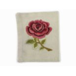 A SPARE ENGLAND INTERNATIONAL RUGBY UNION JERSEY BADGE CIRCA 1908 with embroidered English rose from