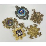 FIVE MASONIC MEDALS four in hallmarked 9ct gold of which two are enamel decorated, the other in