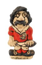 GROGG CARICATURE BY JOHN HUGHES standing on titled base, 'Loosehead Lloyd', wearing Wales No.1