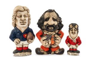 THREE GROGG CARICATURES BY JOHN HUGHES two standing on titled bases, 'Phil Bennett' wearing his