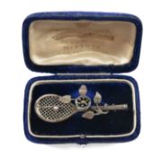 VICTORIAN TENNIS RACKET BAR BROOCH, unmarked white metal almost certainly silver, the handle wrapped