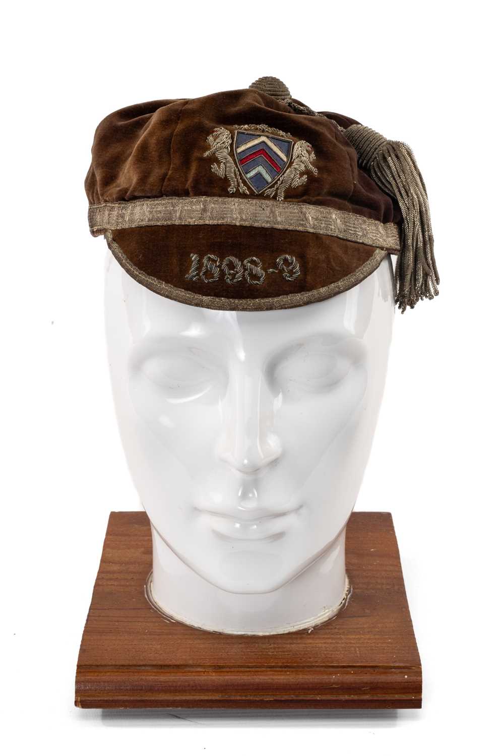 A VICTORIAN RUGBY UNION CAP for Glamorgan County, 1898-9 embroidered to peak, crest of tricolour