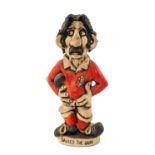 GROGG CARICATURE BY JOHN HUGHES standing on titled base, 'Davies the Dash', wearing Wales No.11