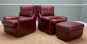 PAIR MODERN LEATHER EASY ARMCHAIRS AND OTTOMAN, upholstered in burgundy leather, padded arms,