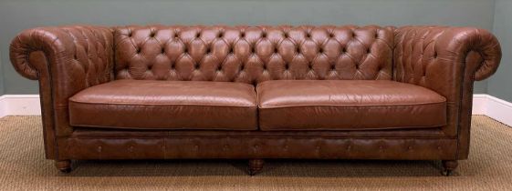 THOMAS LLOYD LEATHER CHESTERFIELD, buttoned back and arms, turned wooden legs on castors, 75 (h) x