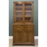 EARLY 20th CENTURY OAK BOOKCASE CUPBOARD, the top with twin glazed doors and adjustable shelves, the