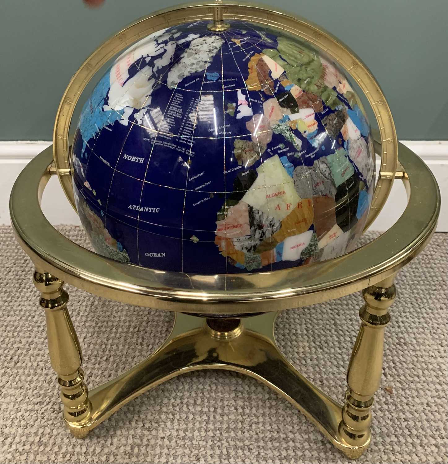 TERRESTRIAL MINERAL GLOBE in a gilt metal tripod stand, 43 (h) cms Provenance: Private collection