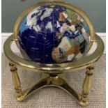 TERRESTRIAL MINERAL GLOBE in a gilt metal tripod stand, 43 (h) cms Provenance: Private collection
